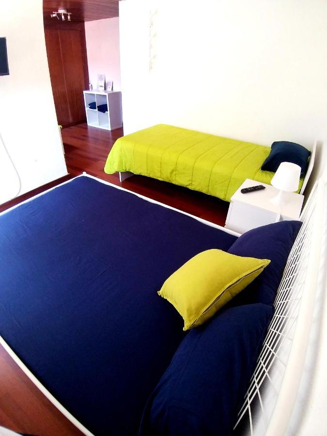 Quarto em Acomodações Particulares Theorynomad Rooms Al Lisboa *